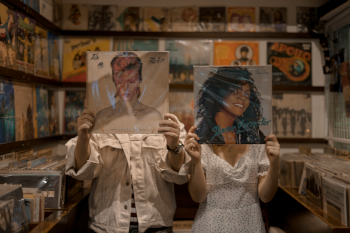 Two people in record shop