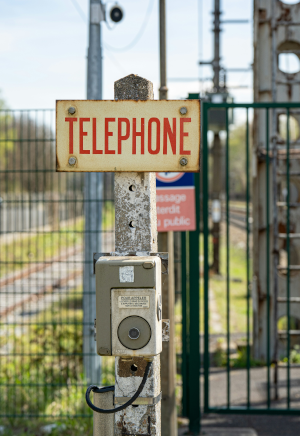Old telephone on pole